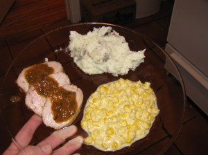 orange glazed roast pork, garlic mashed potatos, creamed corn